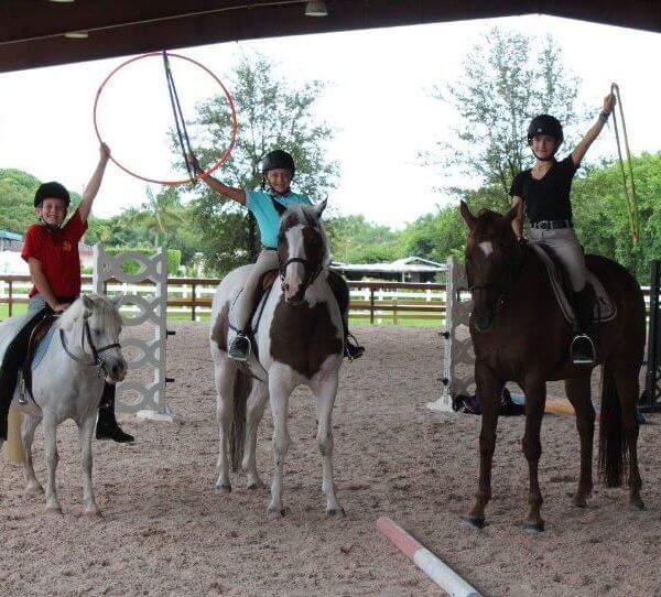 Campers riding horses at Pine Hollow Camp