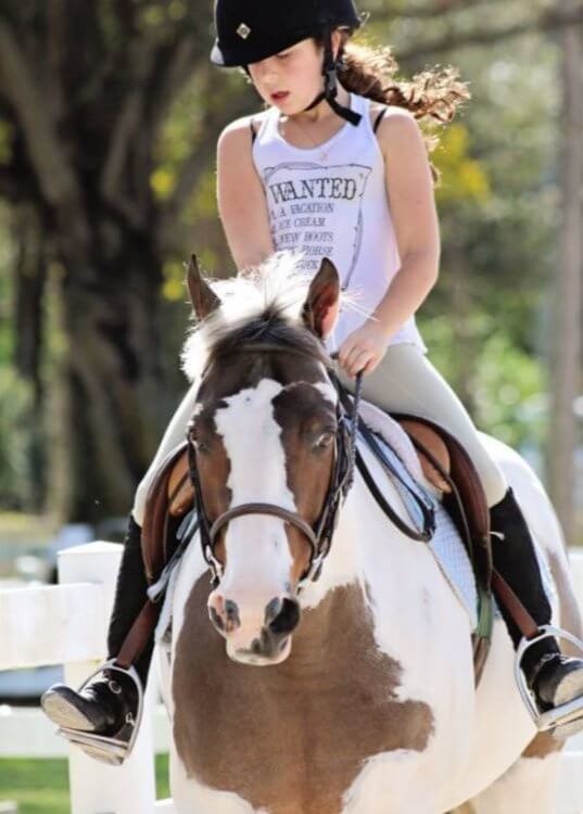 Pine Hollow Lesson Program teaching children horseback riding