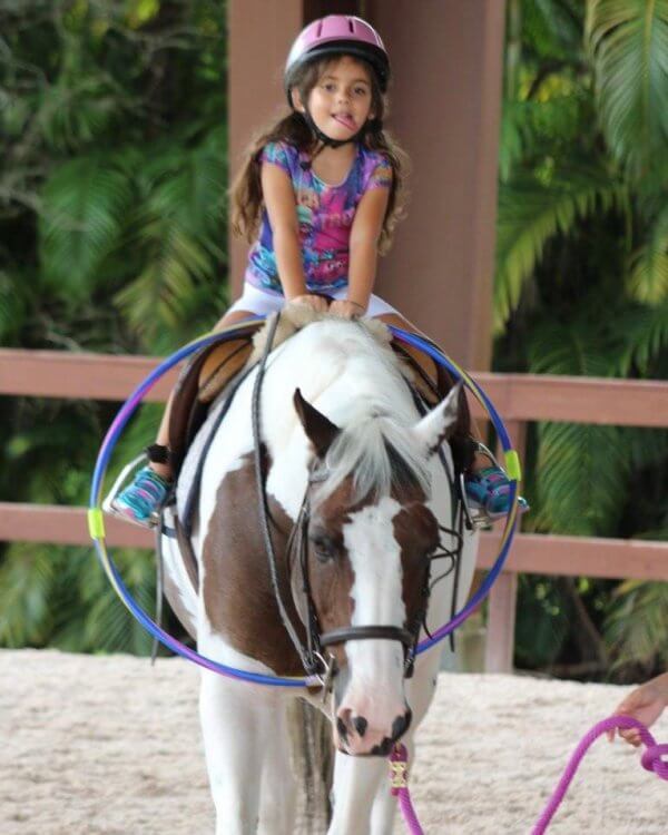 Girl riding a horse