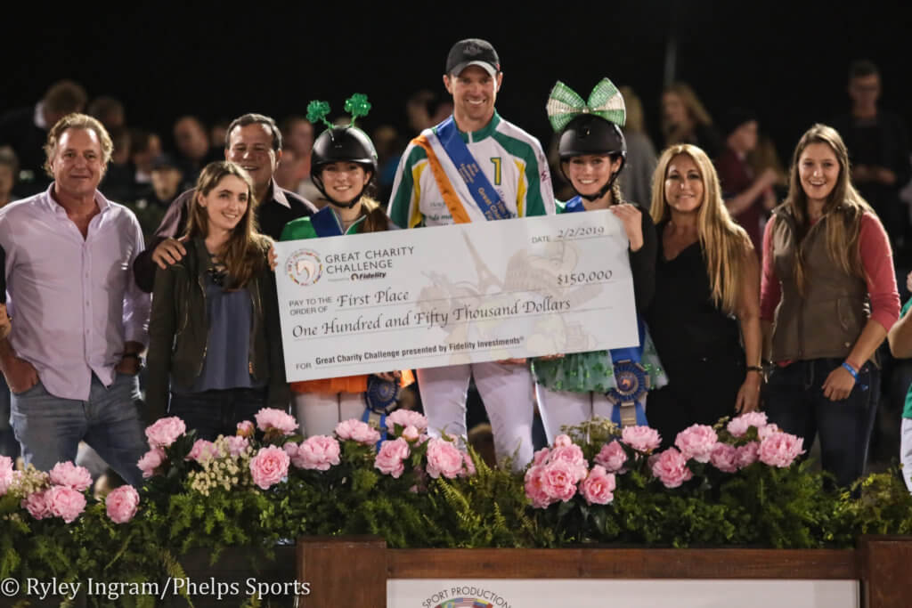 Great Charity Challenge recipients posing with giant check